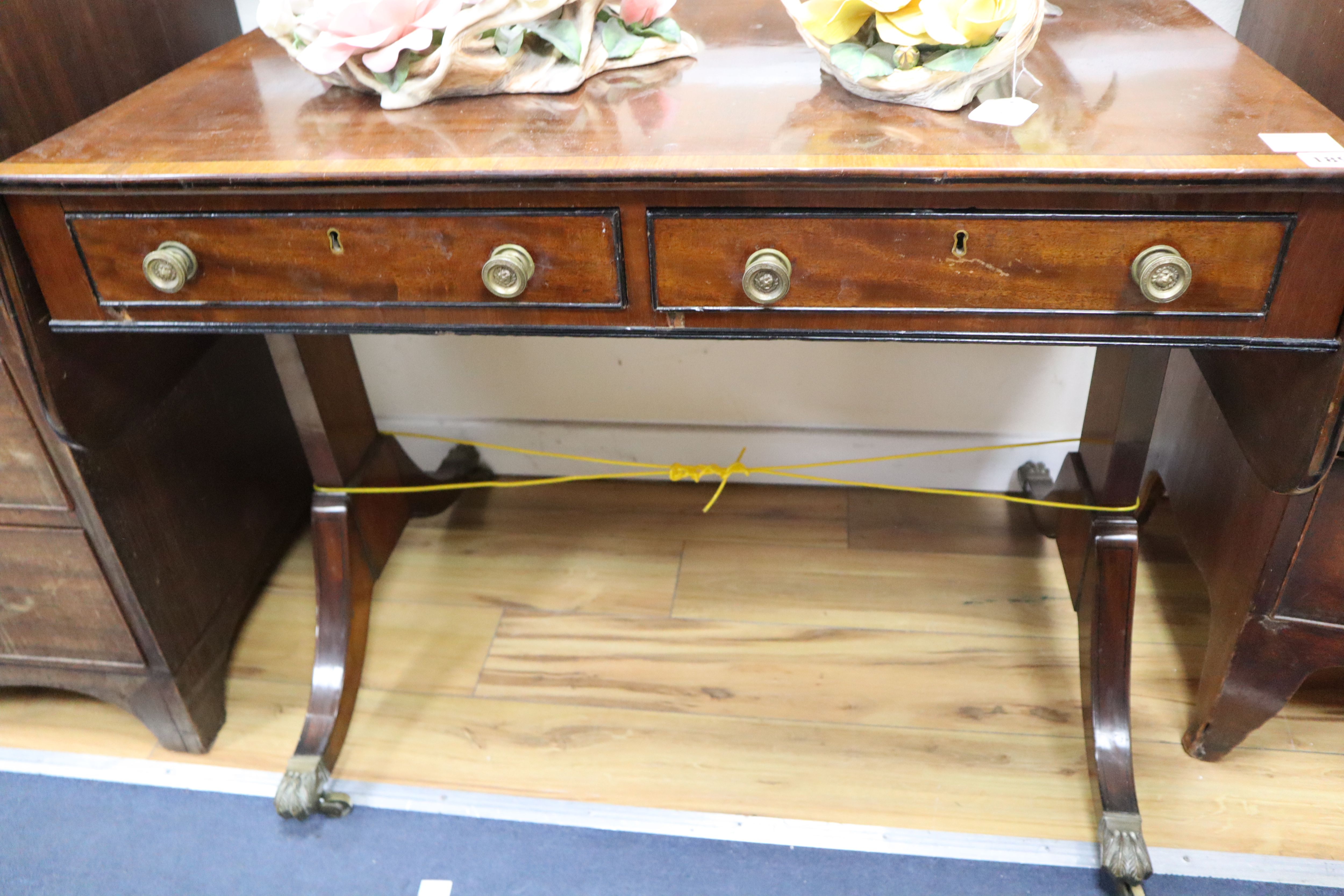 A Regency satinwood banded mahogany sofa table, W.3ft 1in. D.2ft 6in. H.2ft 6in.